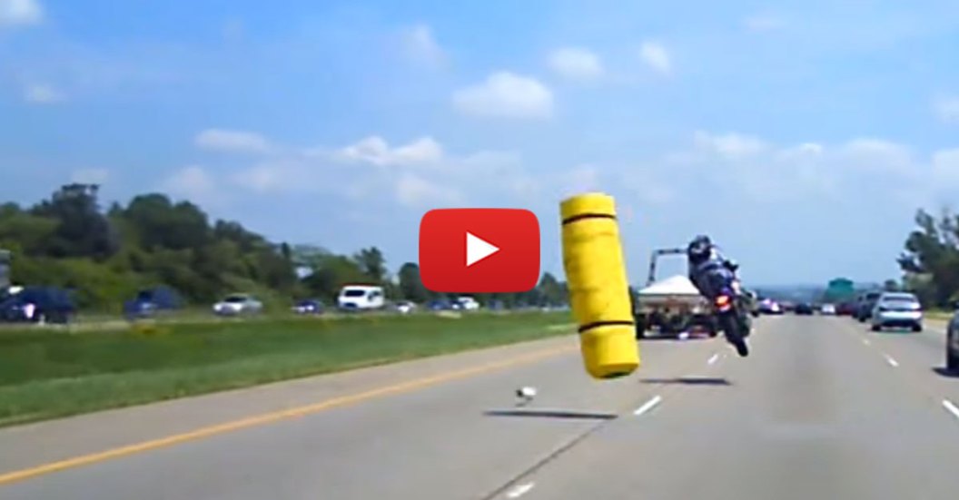 rider-goes-airborne-after-hitting-unsecured-load