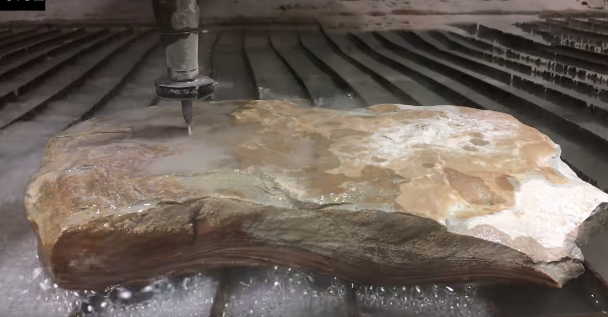 Rock Jet Machine 60,000 psi waterjet cuts clean through solid rock - alt_driver