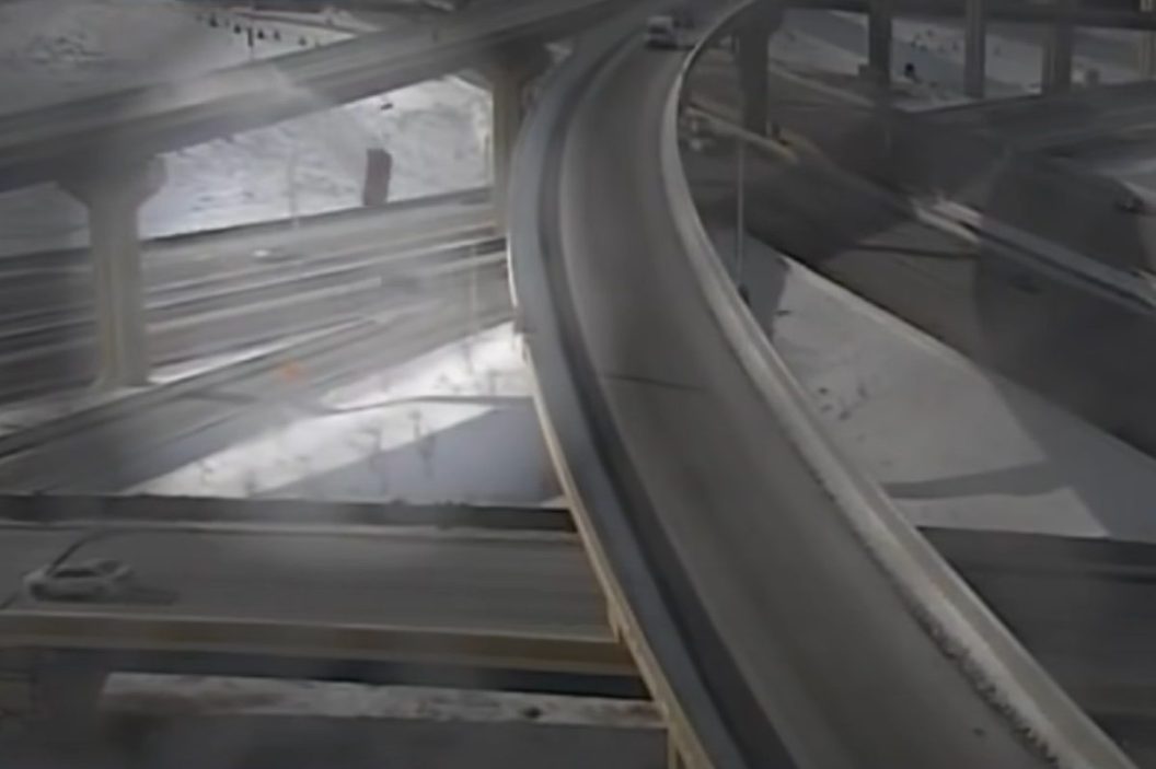 Driver plunges 70 feet off overpass ramp